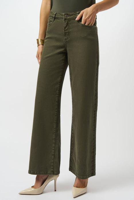 Woman wearing a dark green wide leg denim jean