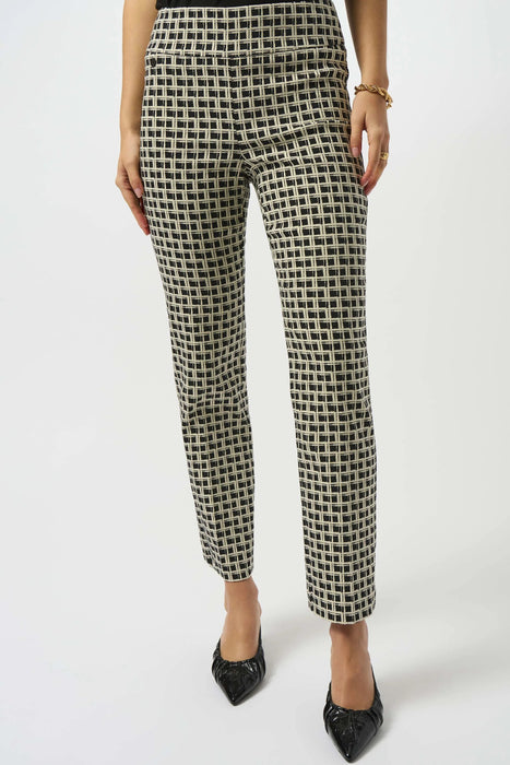 Woman wearing a jacquard slim ankle pant with check pattern