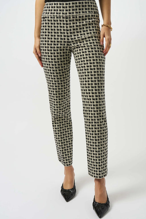 Woman wearing a jacquard slim ankle pant with check pattern