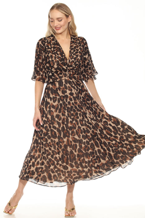 Woman wearing a leopard print pleated chiffon fit and flare dress