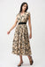 Model wearing Joseph Ribkoff beige and black seersucker abstract print fit and flare dress with cap sleeves, front zip detail, and cinched waist for a flattering silhouette.