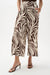 Woman wearing Joseph Ribkoff beige/brown animal print pleated culotte pants styled for resort vacation, brunch, summer outings, and elegant casual wear.