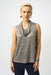 Woman wearing a metallic knit sleeveless top with cowl neck.
