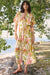 Woman wearing a beige multi tropical print fit and flare dress with tie waist, styled outdoors by the water for a chic summer look