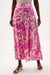 Woman wearing vibrant designer floral pants for summer outfit