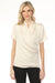 Woman wearing a cream-colored faux wrap top with ruching at the waist and short sleeves from Joseph Ribkoff