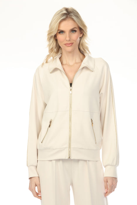 Woman wearing a cream-colored zip up front jacket with pockets and long sleeves from Joseph Ribkoff
