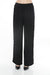 Woman wearing Joseph Ribkoff crochet trim wide-leg pants for elegant office outfit
