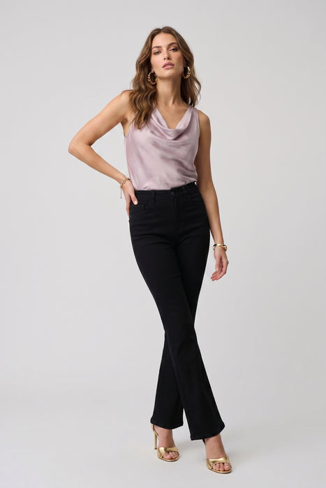 Woman wearing a black straight leg jeans from Joseph Ribkoff