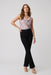 Woman wearing a black straight leg jeans from Joseph Ribkoff
