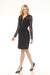 Woman wearing a black shirt dress with lace sleeves and self tie belt from Joseph Ribkoff