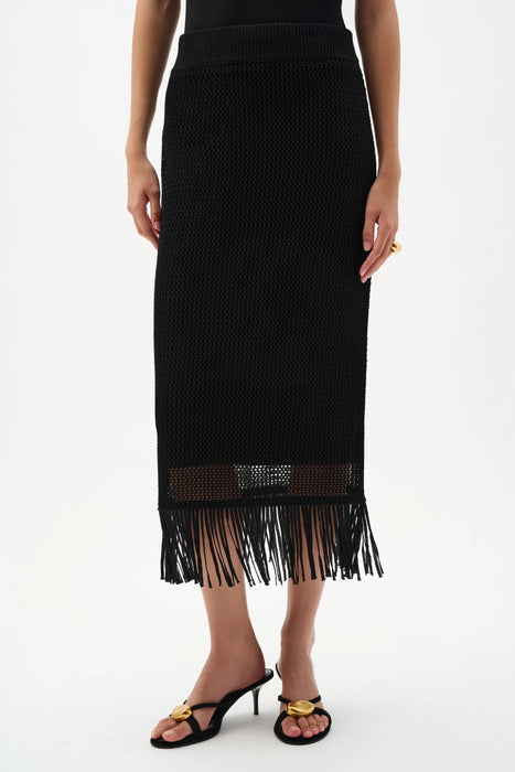 Woman wearing Joseph Ribkoff black fringe sweater knit pull-on midi skirt styled for evening dinner, resort vacation, art events, and chic casual occasions.