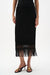 Woman wearing Joseph Ribkoff black fringe sweater knit pull-on midi skirt styled for evening dinner, resort vacation, art events, and chic casual occasions.