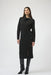 Woman wearing a black sweater knit midi sheath dress with grommet details on the cowl neckline and side from Joseph Ribkoff