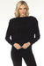 Woman wearing a black high neck top with long dolman sleeves from Joseph Ribkoff