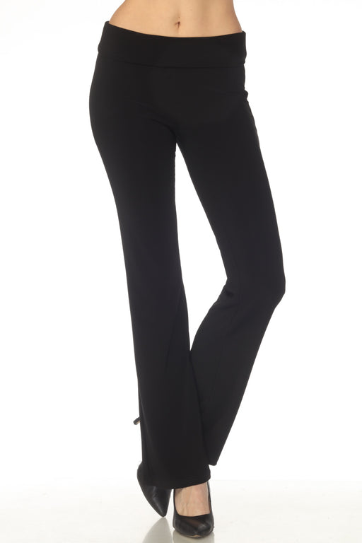 Woman wearing a black solid color flared trouser pant with wide high waistband from Joseph Ribkoff