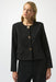 Woman wearing a black solid color blazer jacket with statement button front and long sleeves