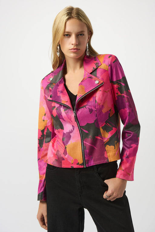 Woman wearing a colorful abstract patterned faux suede moto jacket