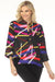 Woman wearing a colorful abstract patterned textured jacket with 3/4 sleeves from Joseph Ribkoff