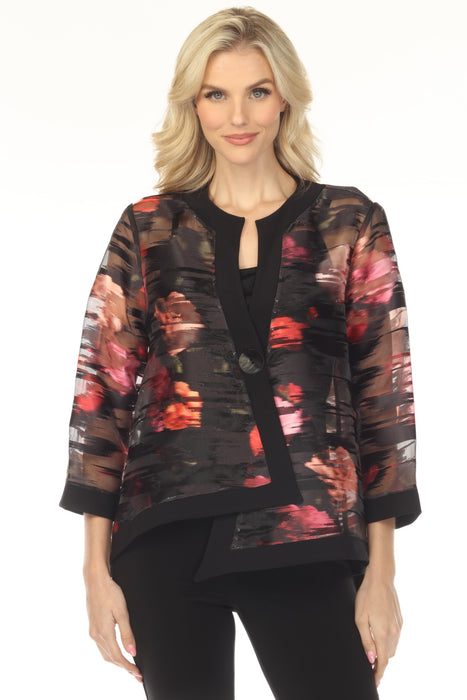 Woman wearing a floral patterned organza jacket with solid trim edges from Joseph Ribkoff