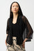 Woman wearing a black sheer jacket with open front and 3/4 sleeves from Joseph Ribkoff