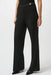 Woman wearing a solid color black wide leg trouser pant