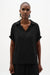 Woman wearing a black short sleeves top with collared v-neck from Joseph Ribkoff