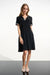 Woman in a black polo dress with striped trim at the v-neck and short sleeves from Joseph Ribkoff