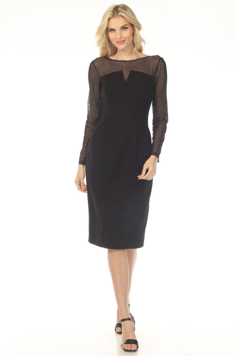 Woman wearing a black sheath dress with studded mesh yoke and sleeves from Joseph Ribkoff