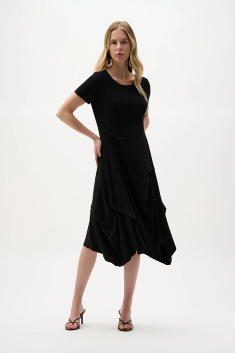 Woman wearing Joseph Ribkoff trapeze dress with boat neck for elegant office outfit
