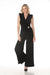 Woman styling Joseph Ribkoff black designer jumpsuit with gold buckle for cocktail party