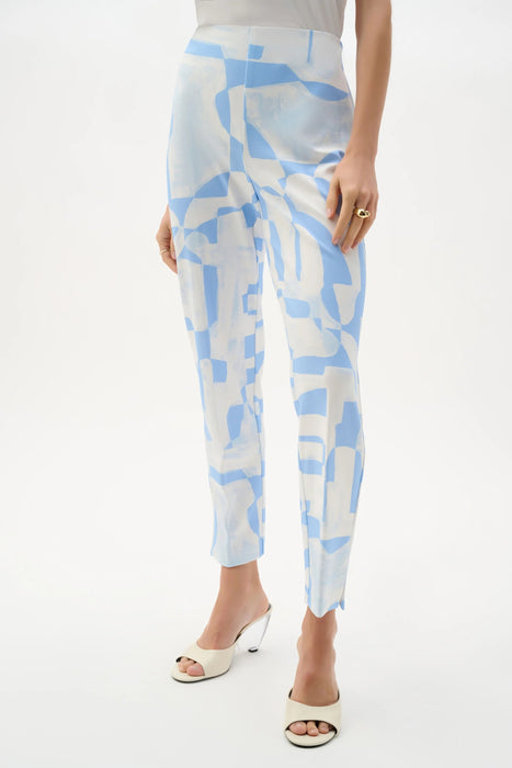 Woman wearing a blue and beige geometric printed straight ankle pants with pull on waistband from Joseph Ribkoff