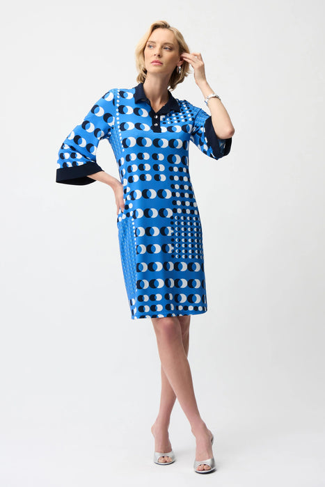 Woman wearing Joseph Ribkoff dot print shirt dress for chic office outfit