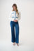 Woman wearing Joseph Ribkoff button closure casual jacket with contrast trim, featuring structured fit, decorative pockets, and chic modern styling paired with denim.
