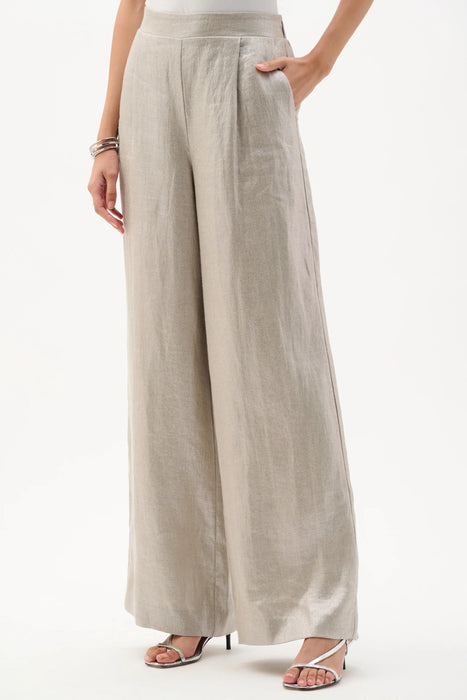 Woman wearing Joseph Ribkoff champagne linen pull-on wide-leg pants styled for resort vacation, summer brunch, vacation travel, and elegant daytime occasions.
