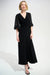 Woman wearing blue chiffon sleeve wide leg jumpsuit with wide leg silhouette and elegant evening style