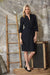 Woman wearing Joseph Ribkoff half-zip denim dress for casual office outfit
