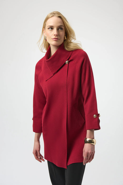 Woman wearing a red sweater knit cardigan with overlap collar and cropped sleeves from Joseph Ribkoff