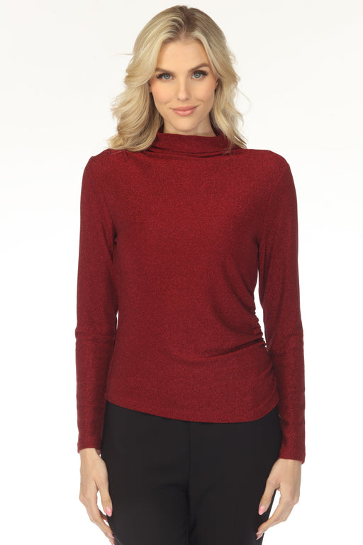 Woman wearing a shimmery red fitted top with mock neck and ruching at the side from Joseph Ribkoff