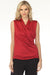 Woman wearing a sleeveless red top with a draped wrap neck design from Joseph Ribkoff