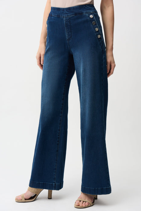 Woman wearing wide-leg pull-on denim jeans with sailor-inspired button details, styled for casual chic outfits, travel, weekend outings, or elevated everyday wear.