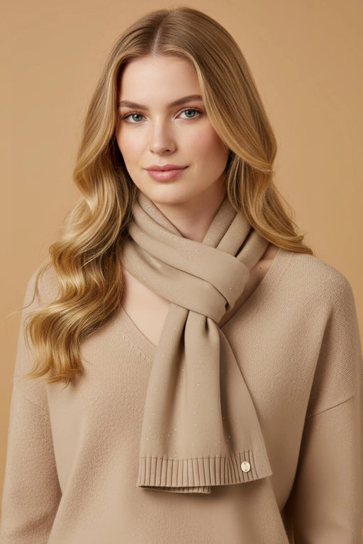 Woman wearing beige knit scarf with tone-on-tone sequins from Joseph Ribkoff
