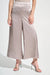 Woman wearing a gray satin wide leg pants with rhinestone embellishments and pull on high waist from Joseph Ribkoff