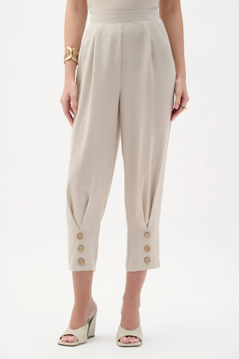 Woman wearing Joseph Ribkoff gauze pull-on barrel pants with pleated design