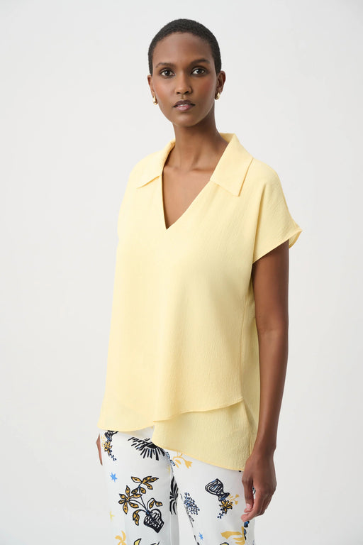 Woman wearing Joseph Ribkoff high-low layered chiffon top with shirt collar styled for office wear, business casual looks, summer events, and elegant outings.