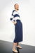 Woman wearing a Joseph Ribkoff pull-on midi skirt with drawstring waist and side pockets, styled with a fitted top for a polished casual-chic look.