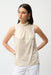 Woman wearing ivory sleeveless top with gold metallic sheen and mock neck from Joseph Ribkoff