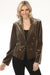 Woman wearing a khaki velvet blazer jacket with double breast button accents from Joseph Ribkoff