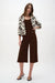 Woman wearing a brown Joseph Ribkoff silky knit culotte pants for elegant office outfit