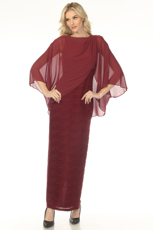 Woman wearing a red evening dress with ruched base and a chiffon overlay from Joseph Ribkoff